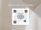 A square QR code centered on a soft beige background with the text 'scan to view the website' above it. The QR code contains a decorative blue and gray emblem in the center.